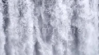 瀑布特写慢动作背景，斯科加福斯冰岛。抽象的水背景。真实的水纹理